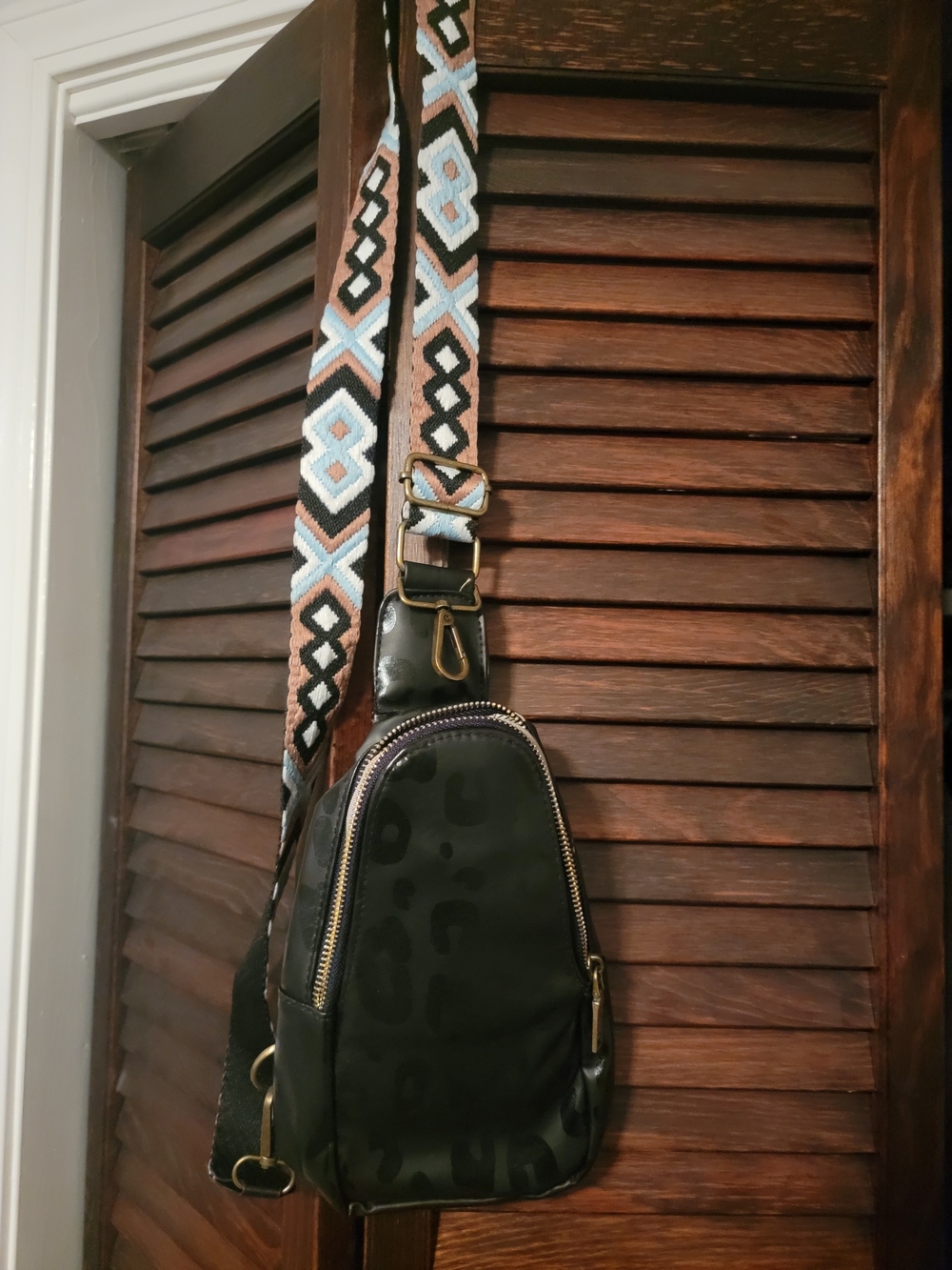 Black Leopard-Print Crossbody Sling Bag with Patterned Strap